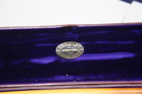 An Edwardian F. Edwards & Co of Glasshouse Street leather cased set of two gold banded meerschaum cigar 10.25in.